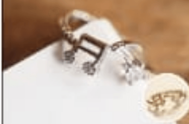 Silver Zsteimi musical note ring x 12